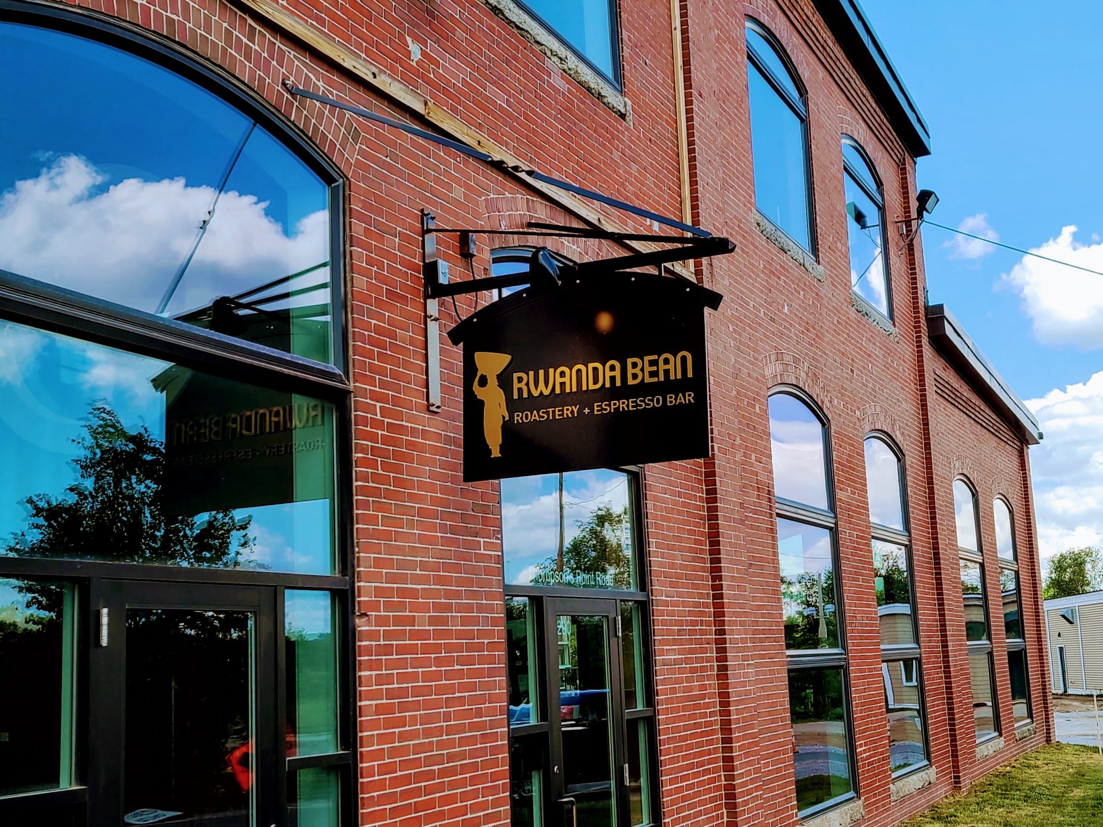 a sign on the side of a brick building