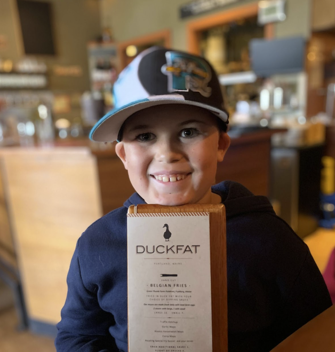 a boy wearing a hat