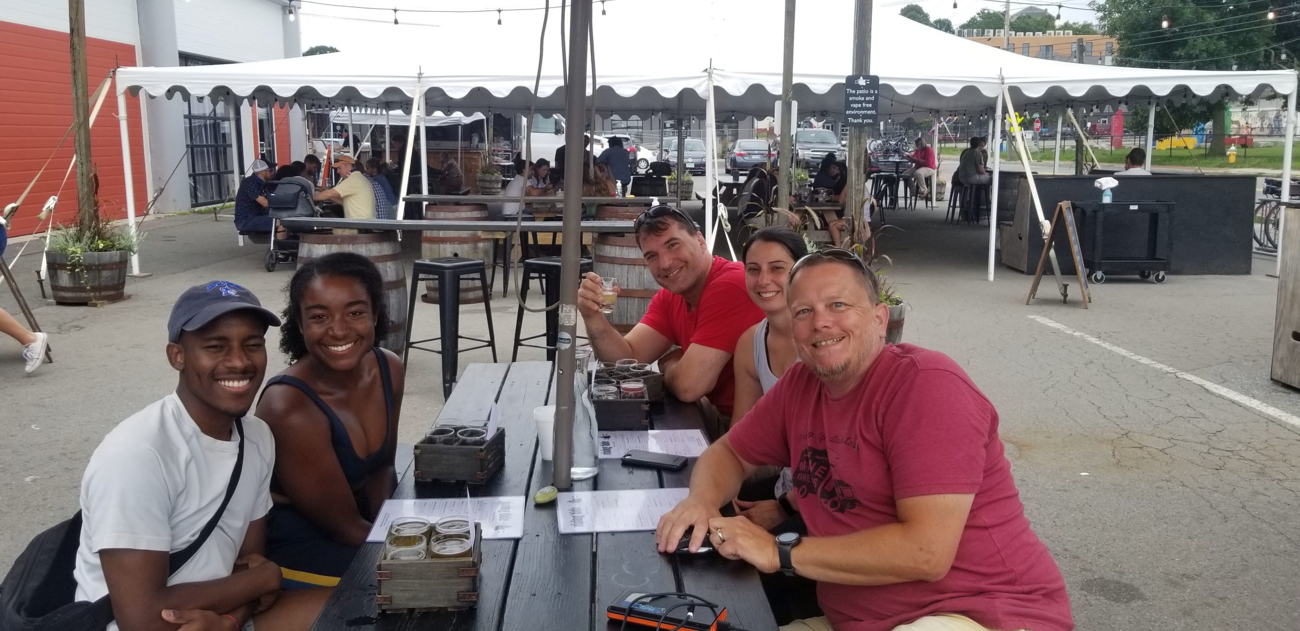 Jamal Edwards et al. sitting at a table