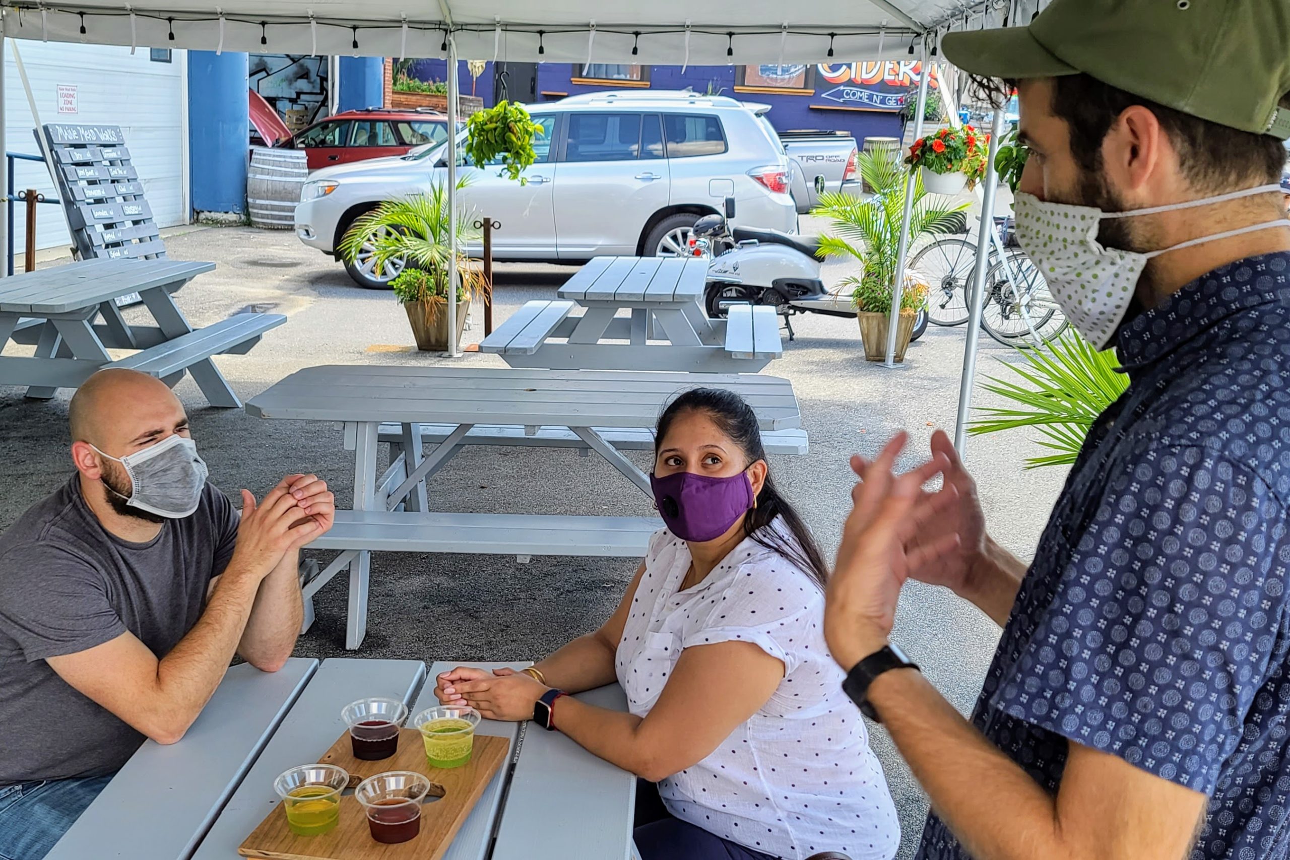 a group of people sitting at a table