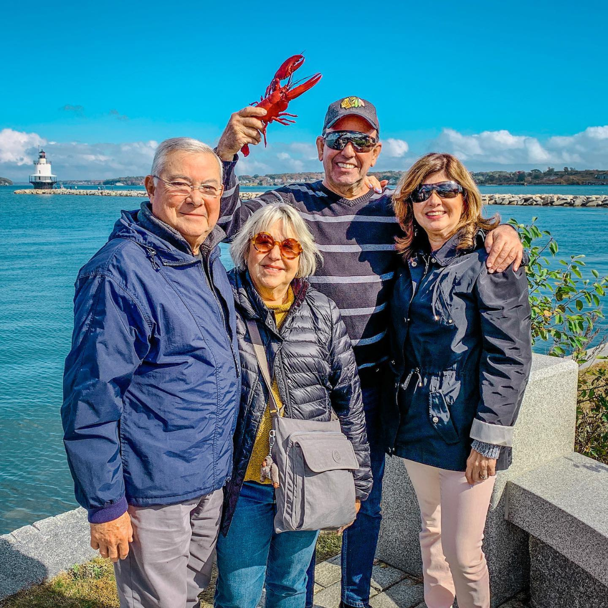 couples on tour of portland maine with lobster