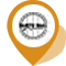 Orange map pin icon with a transparent center circle on a black background.
