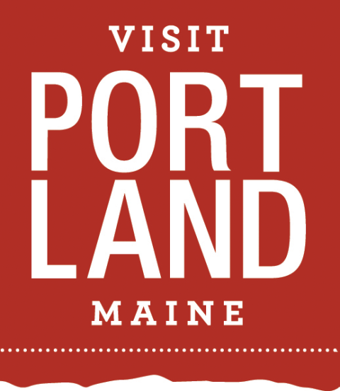 Red banner with white text: Visit Portland Maine.